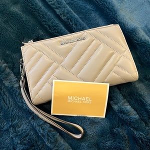 Michael Kors quilted leather wristlet/clutch